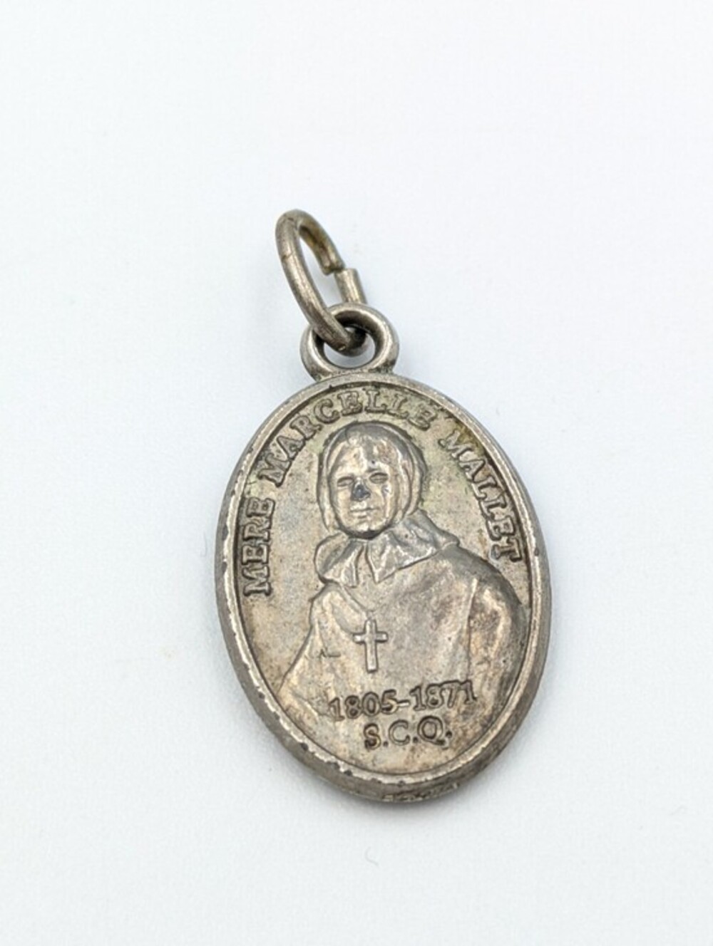 Vintage silver-toned Catholic relic medal Mère Marie-Anne-Marcelle Mallet